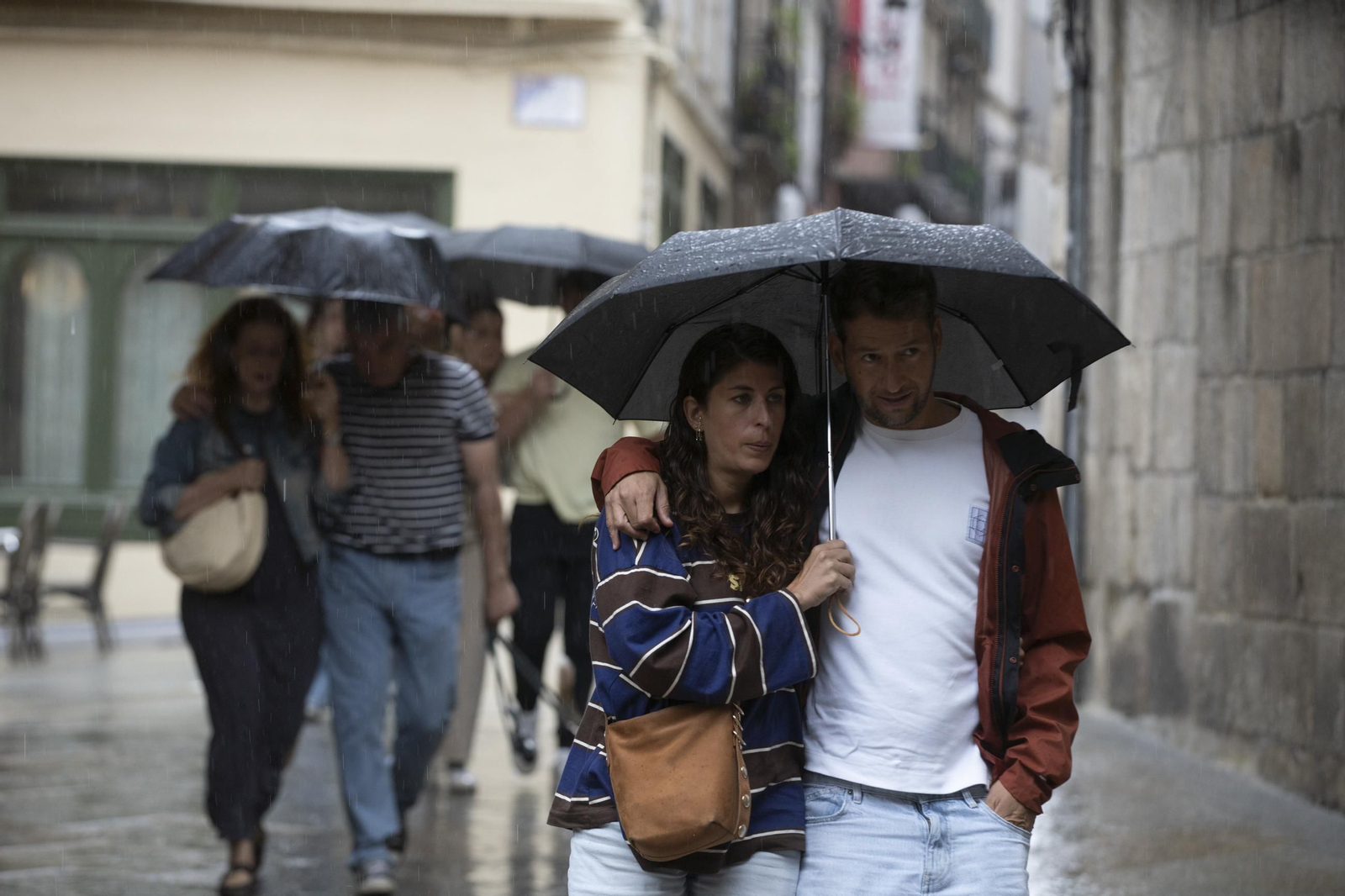 Galería | Una tormenta de verano deja Ourense pasada por agua y desploma los termómetros