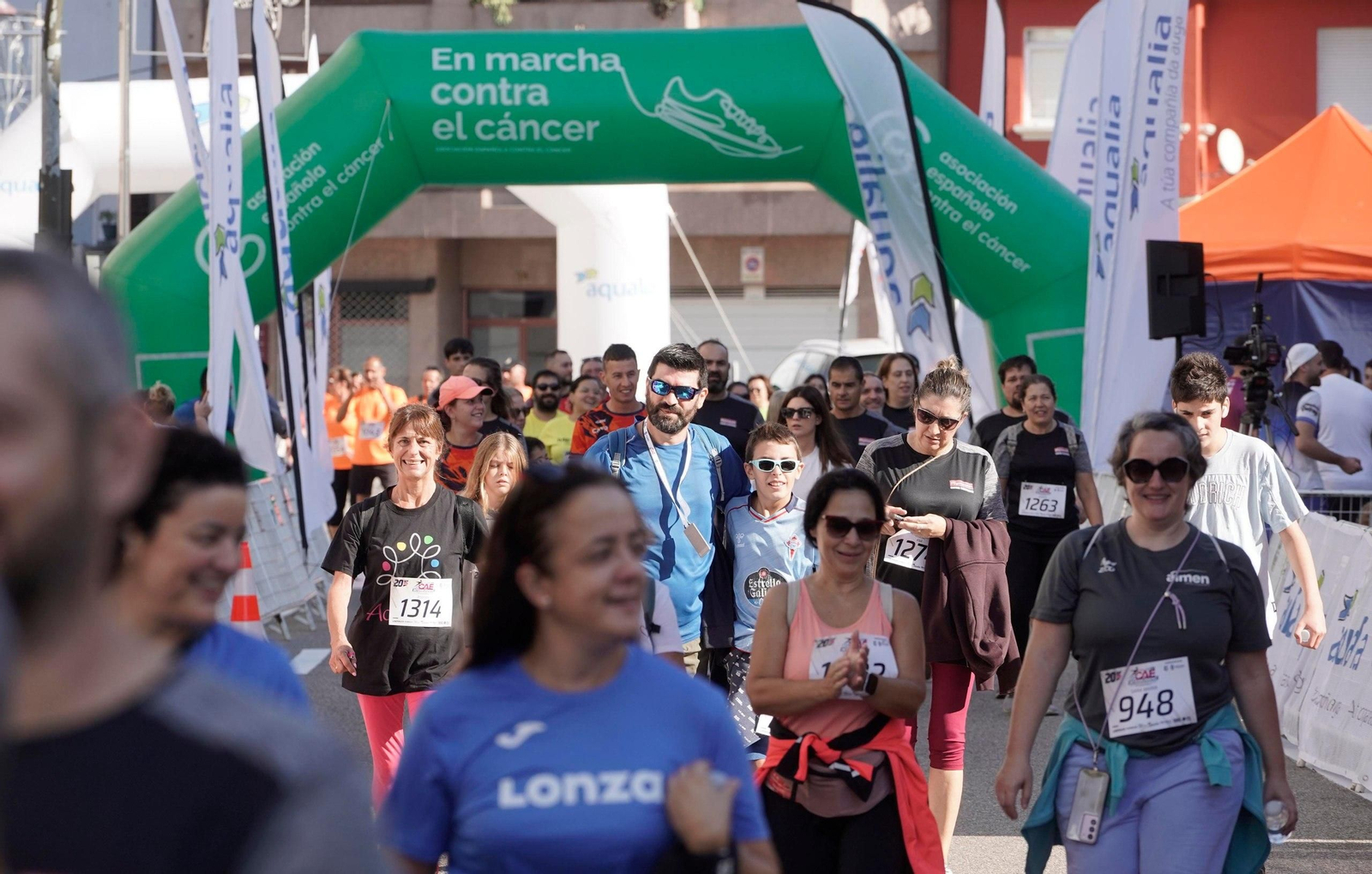 Galería | O Porriño une deporte y trabajo en una carrera multitudinaria