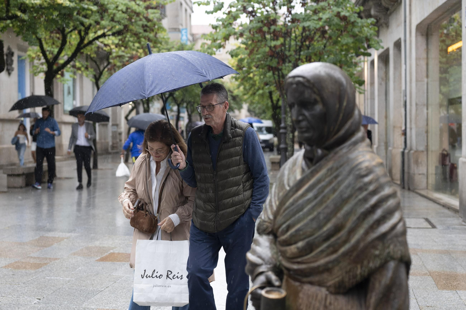 Galería | Otra tarde de agosto pasada por agua en Ourense