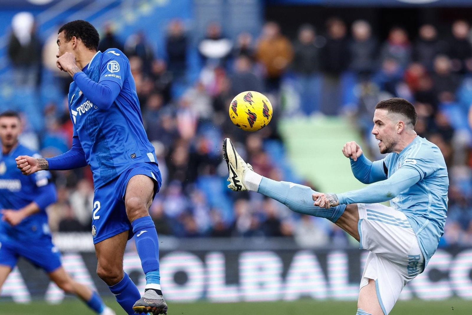 Mihailo Ristic of Celta and Nemenja Maksimovic of Getafe CF in action during the Spanish League, LaLiga EA Sports, football match played between Getafe CF and RC Celta de Vigo at Coliseum de Getafe stadium on February 11, 2024, in Getafe, Madrid, Spain.