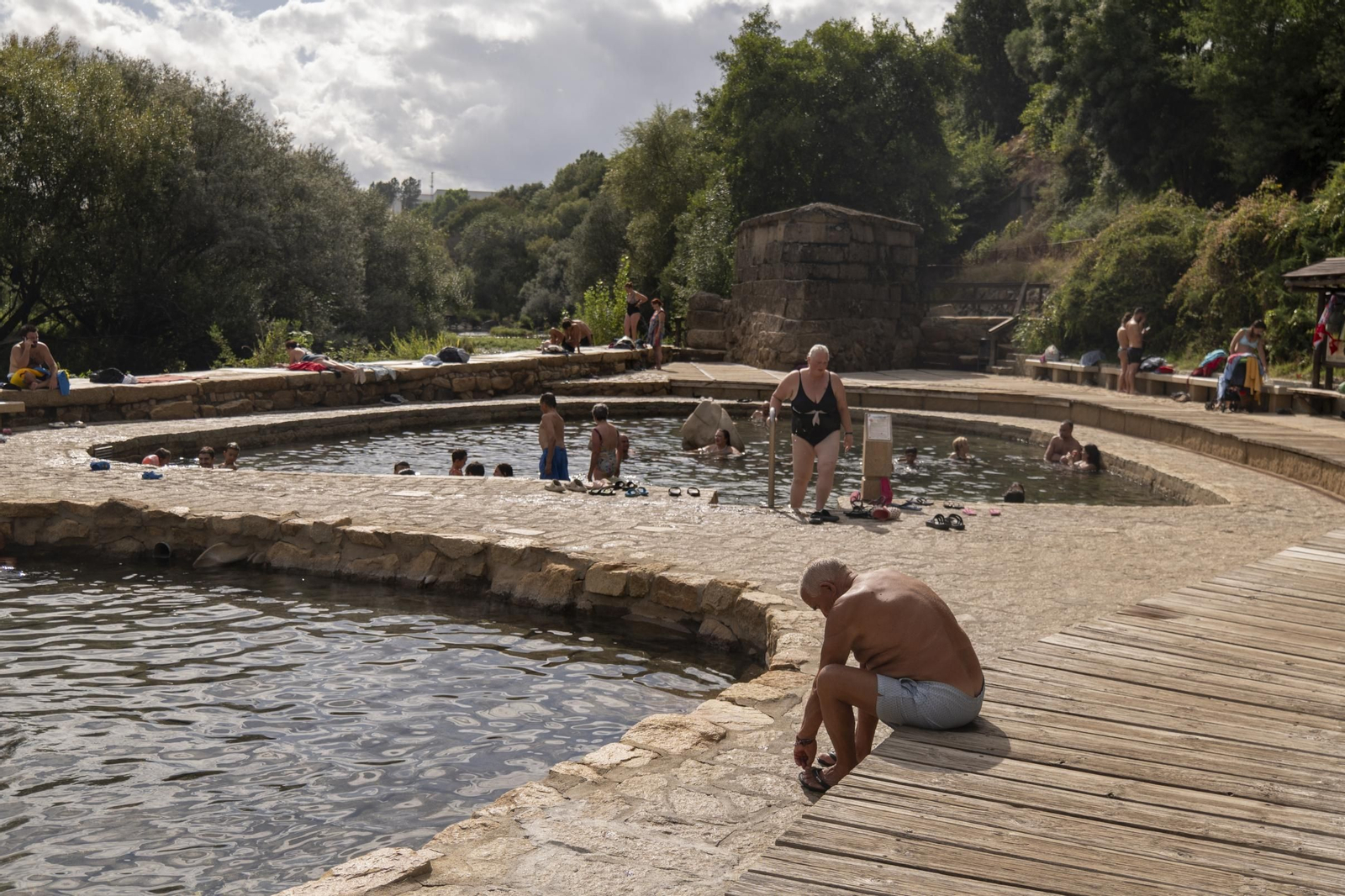 Bañistas en las Termas do Muíño.