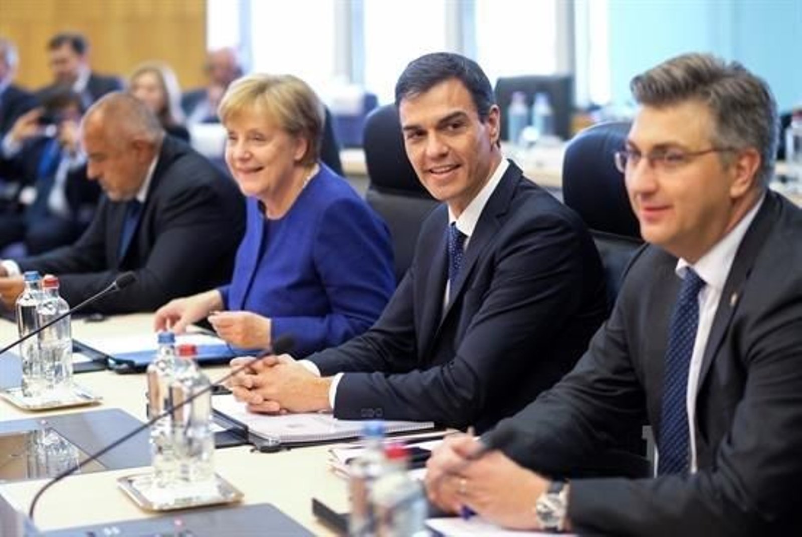 Angela Merkel y Pedro Sánchez.