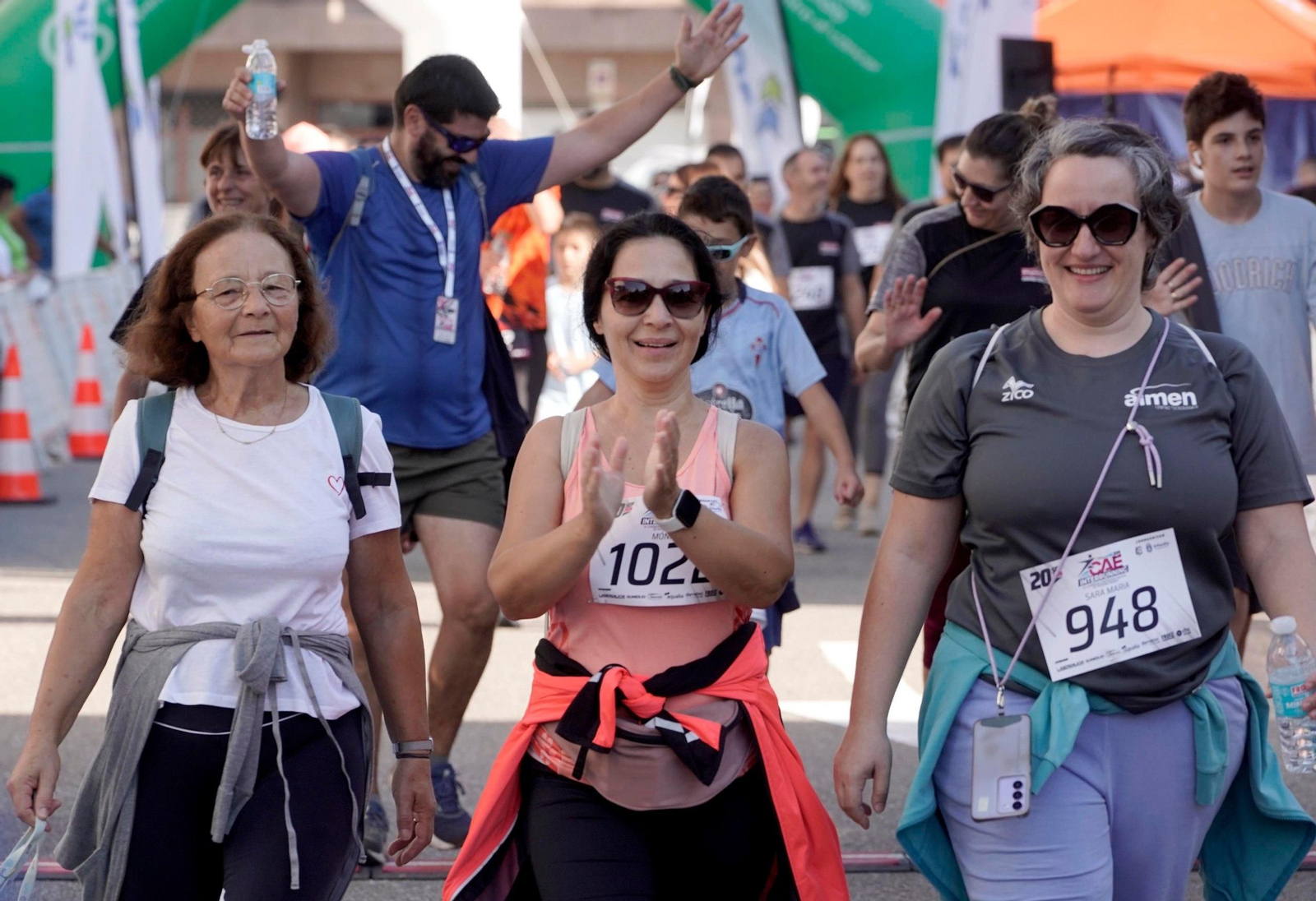 Galería | O Porriño une deporte y trabajo en una carrera multitudinaria