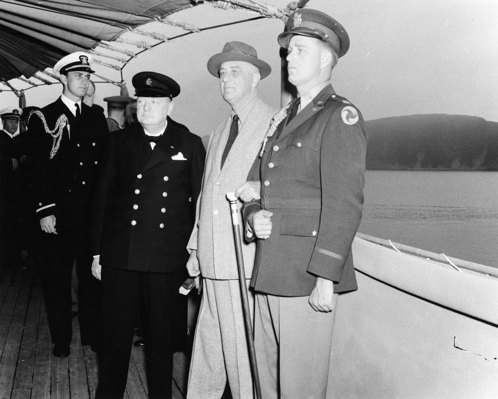 Winston Churchill with Franklin D. Roosevelt on board USS Augusta (CA-31) on 9 August 1941 (NH 67201).jpg