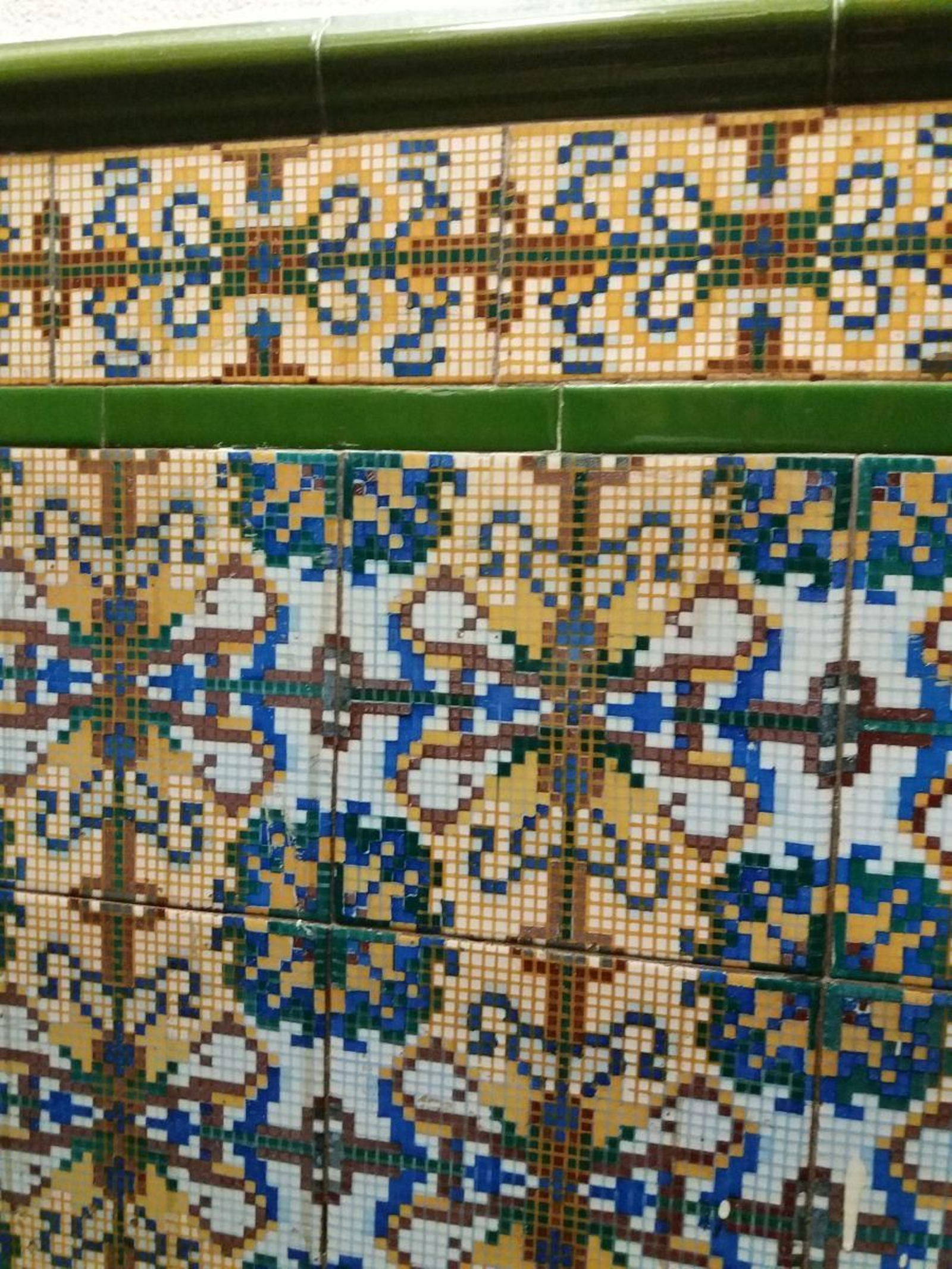 Imitando el bordado de punto de cruz en una pared.
