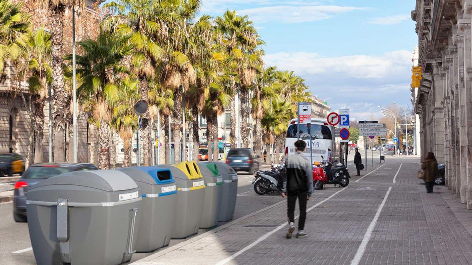 Barcelona, Spain - January 17, 2012: Passeig d'Isabel II (Isabel II Avenue). Traffic in the city downtown. Few pedestrians also visible.