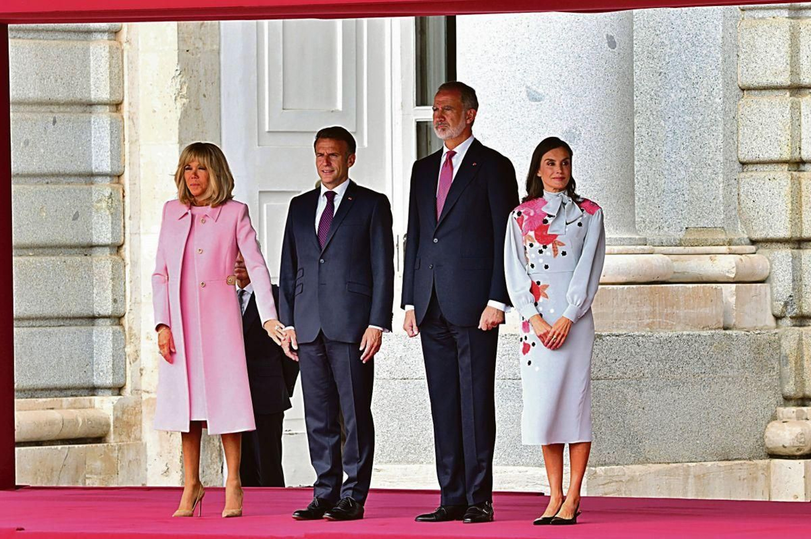 Brigitte Macron, Emmanuel Macron, Felipe VI y la reina Letizia, en el Palacio Real.