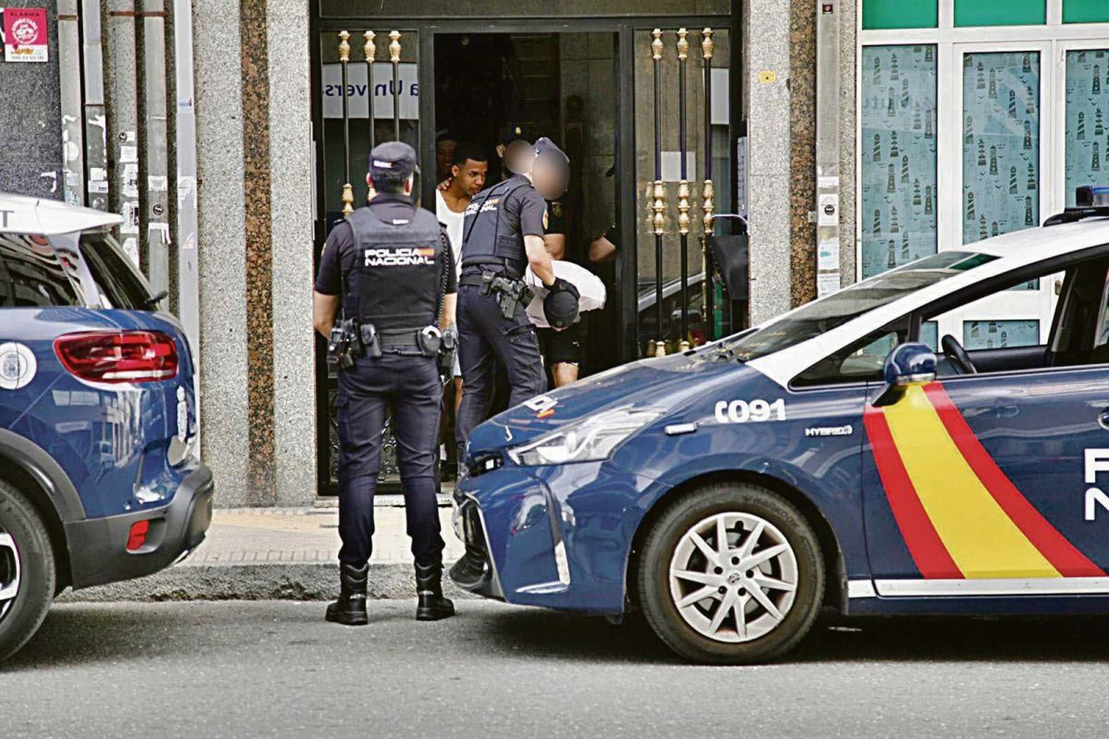 Tres de los detenidos en la redada.