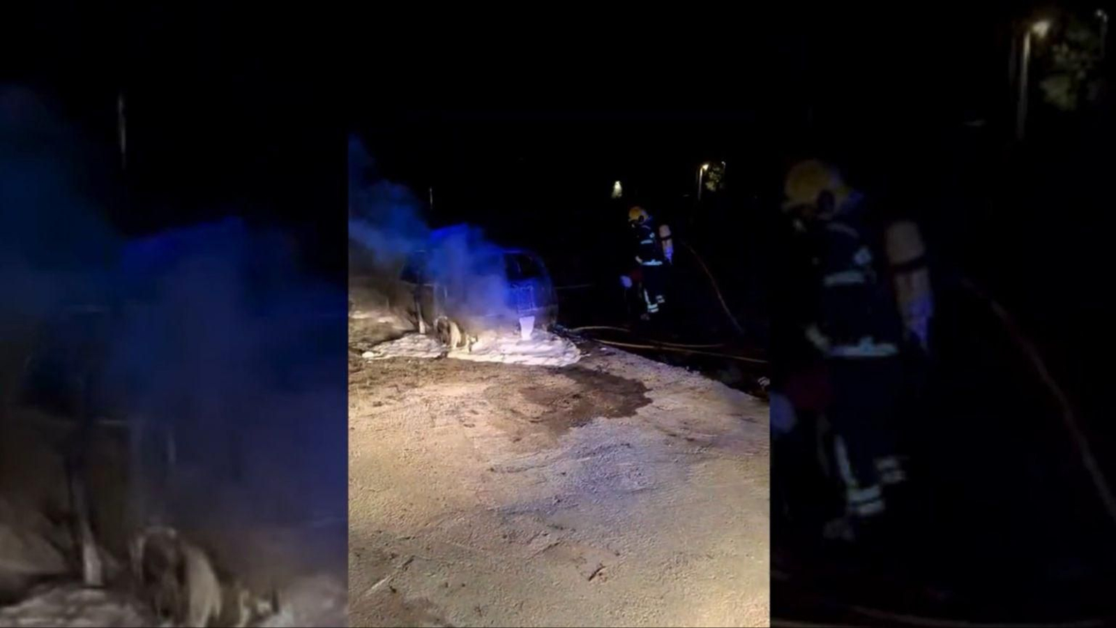 Los bomberos en el lugar del coche calcinado en Moreiras.
