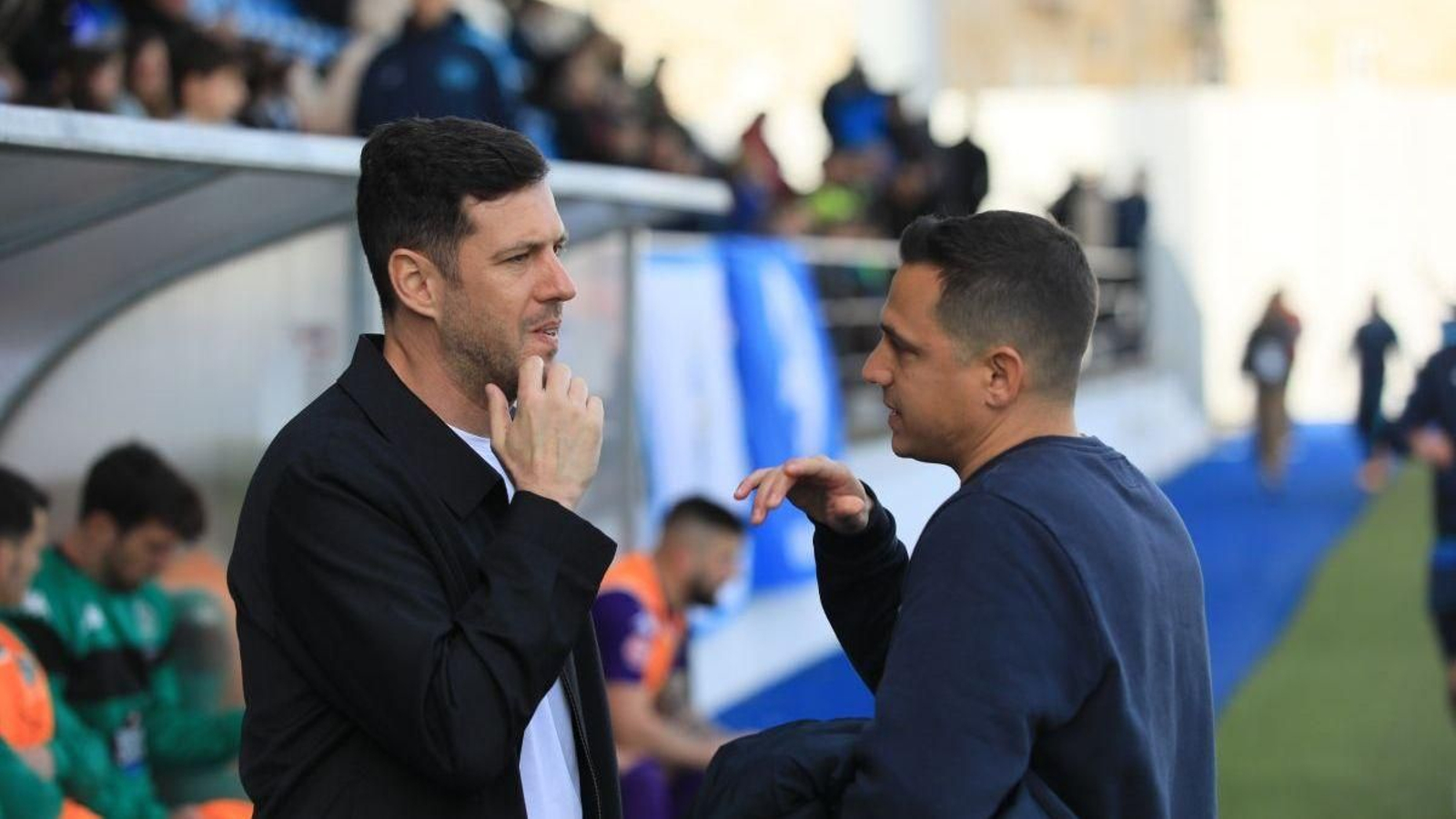 Jorge Cuesta y Dani Llácer, antes de empezar el partido en el campo de O Couto.