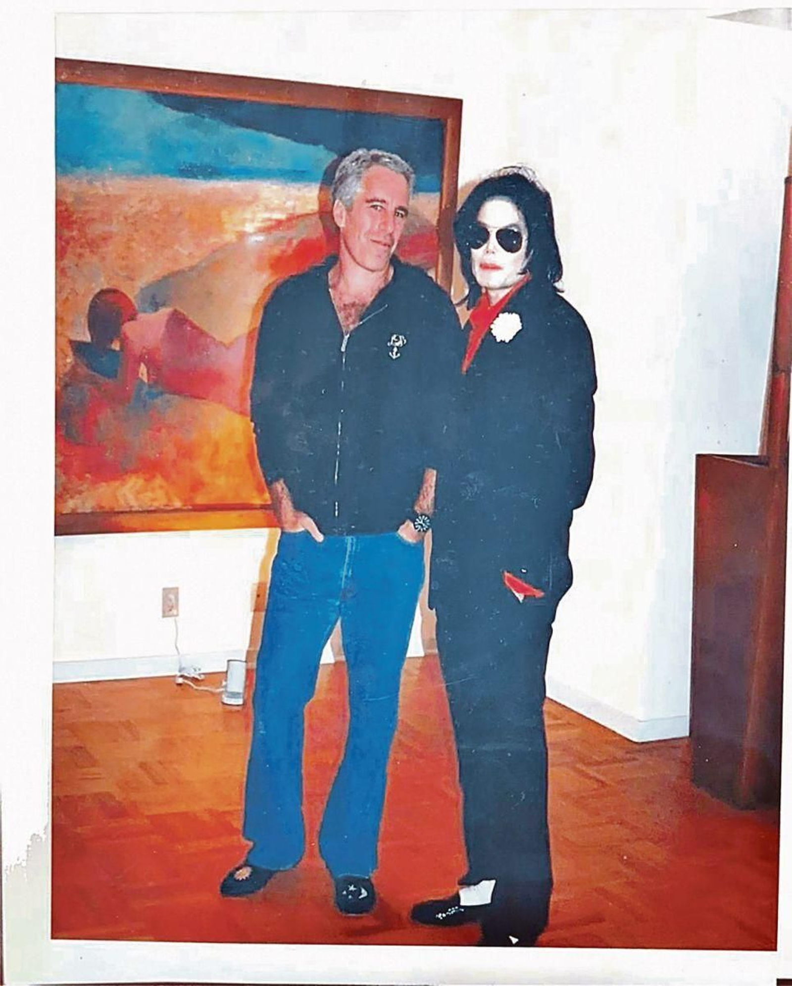 Jeffrey Epstein junto a Michael Jackson.