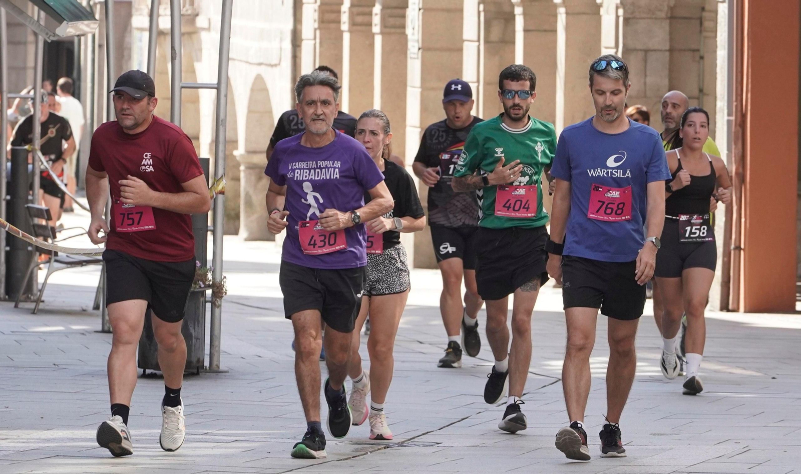 Galería | O Porriño une deporte y trabajo en una carrera multitudinaria