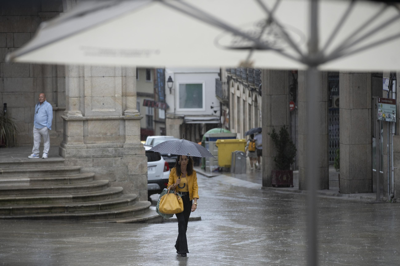 Galería | Una tormenta de verano deja Ourense pasada por agua y desploma los termómetros