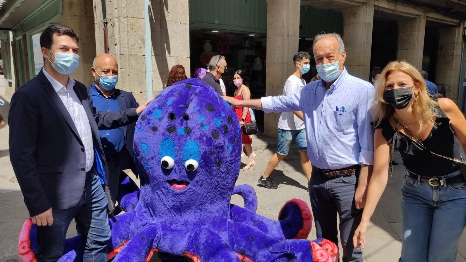 Caballero, Fumega y Ortega, durante la Festa do Pulpo de Carballiño.