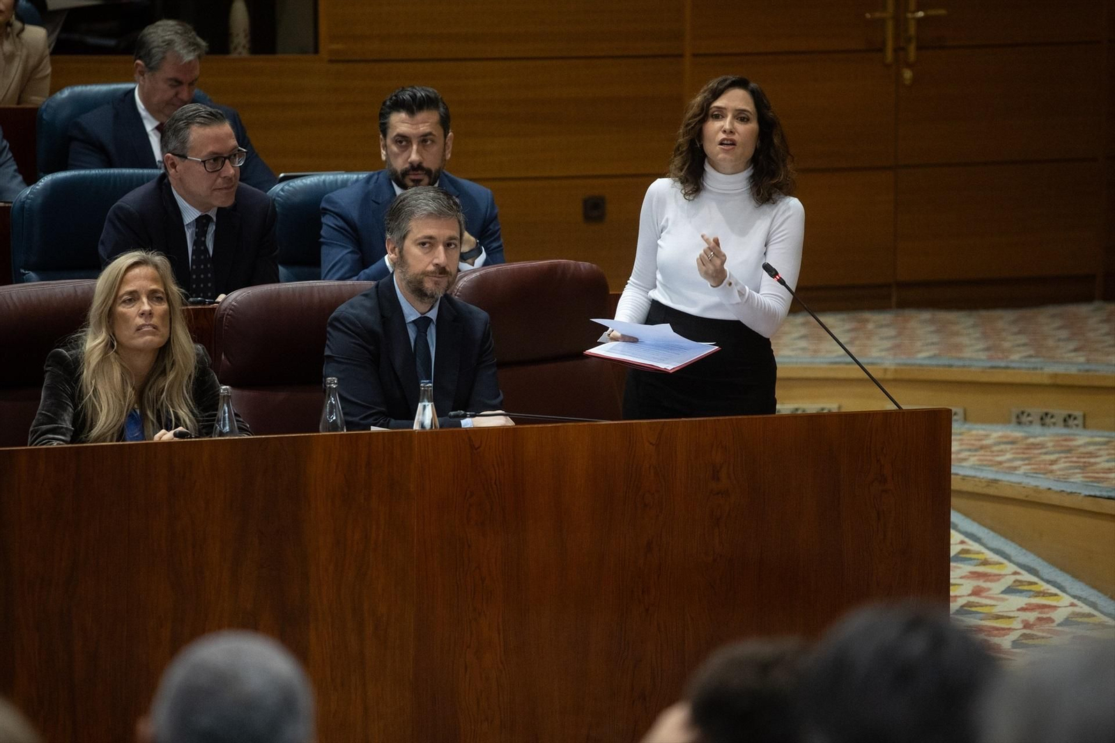 La presidenta de la Comunidad de Madrid, Isabel Díaz Ayuso, durante un pleno en la Asamblea de Madrid, a 13 de marzo de 2025, en Madrid