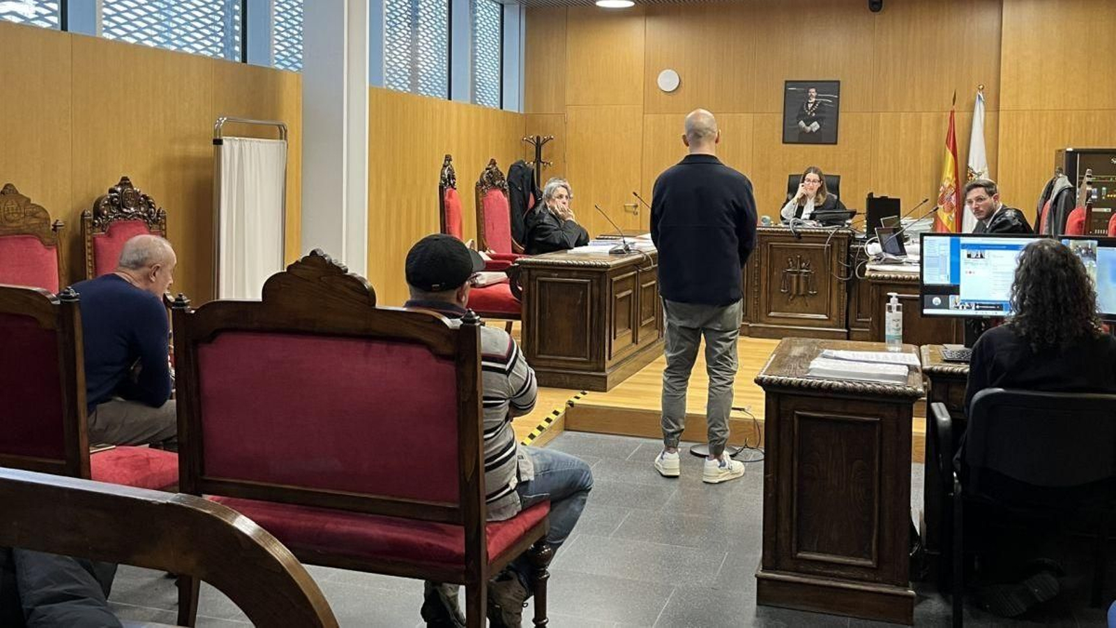 Tres de los cuatro acusados, el primer día de juicio.