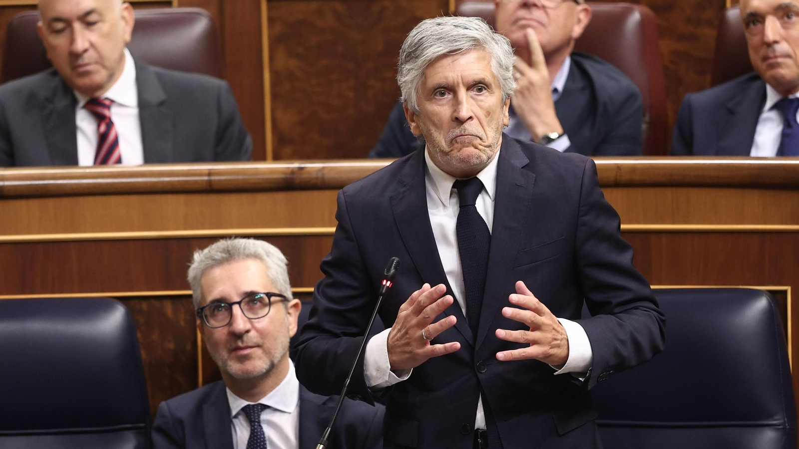 El ministro del Interior, Fernando Grande-Marlaska, interviene durante la sesión plenaria en el Congreso de los Diputados de este miércoles