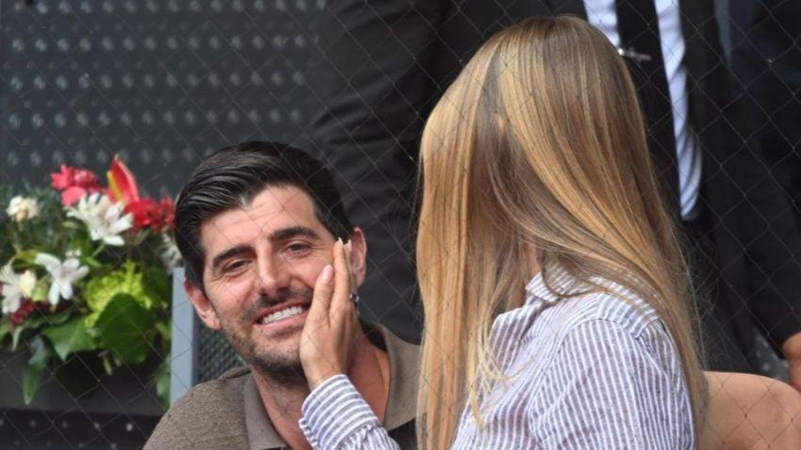 Courtois y Mishel Gerzig, en el Mutua Madrid Open.