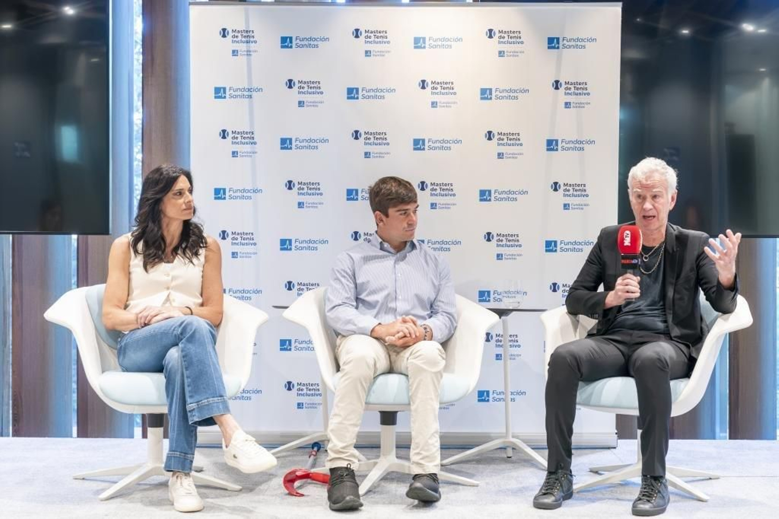 Martín de la Puente, en el centro, con Sabatini y McEnroe.