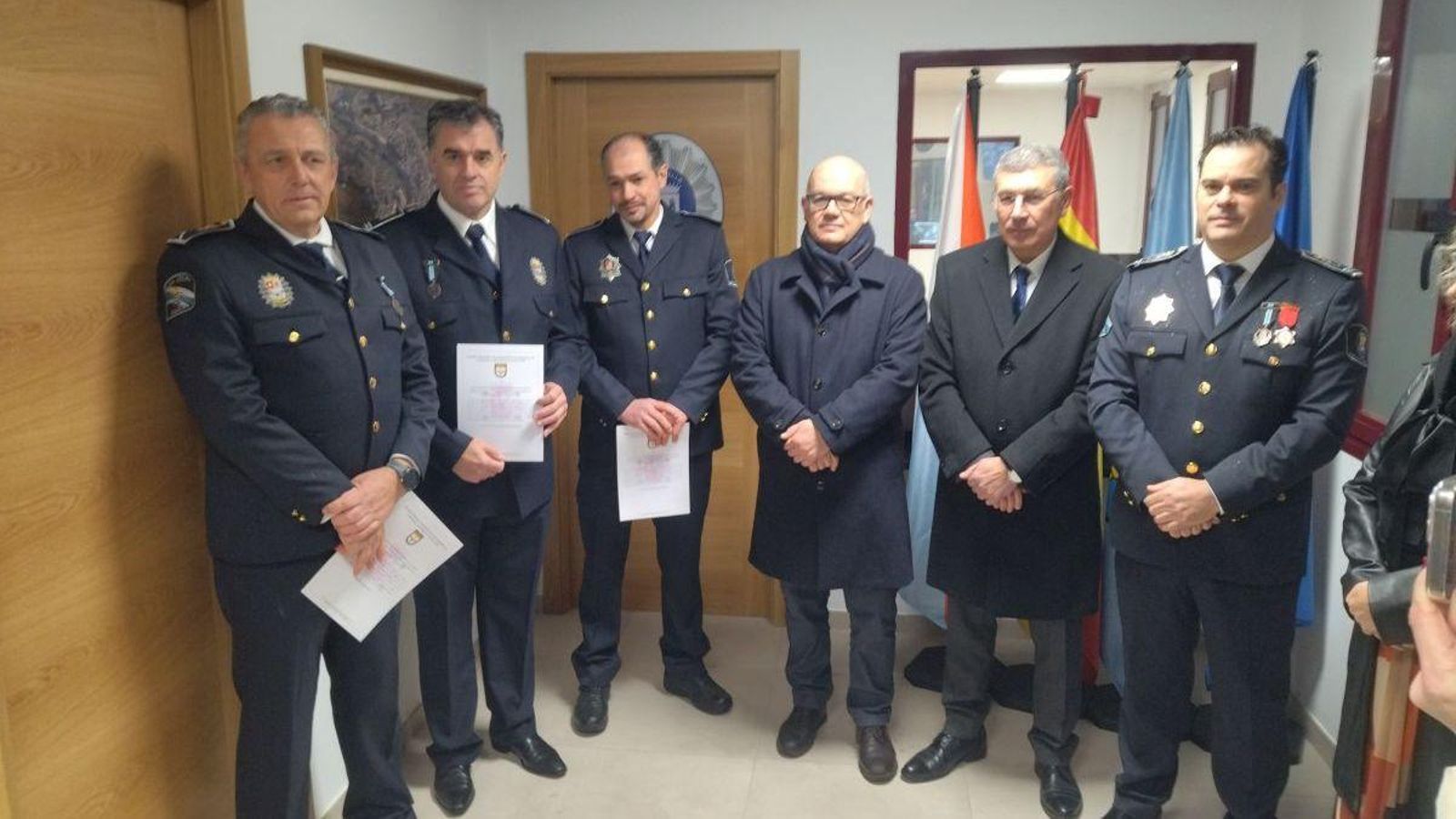 López, Hernández y González, tras recoger los diplomas.