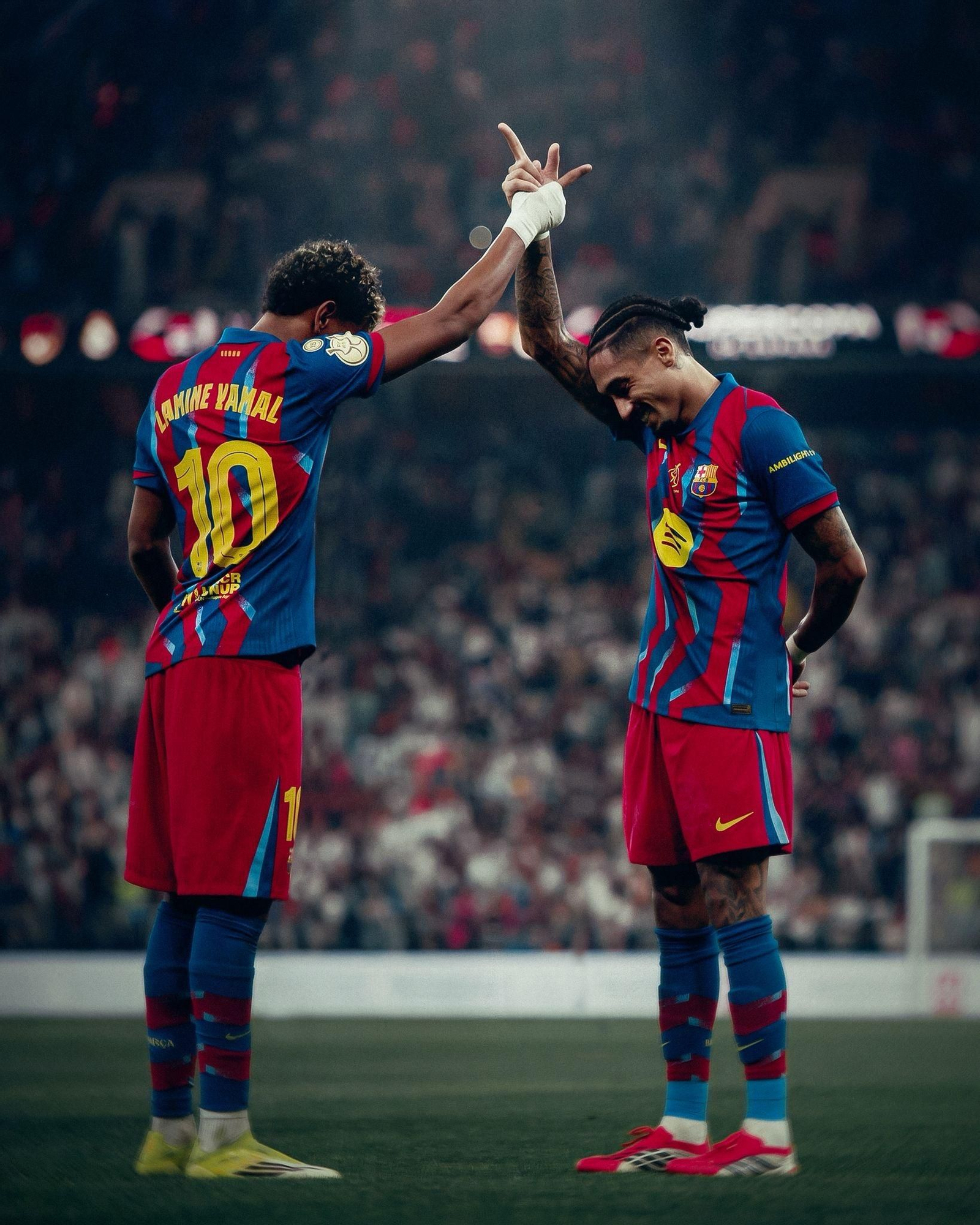 Raphinha y Lamine Yamal