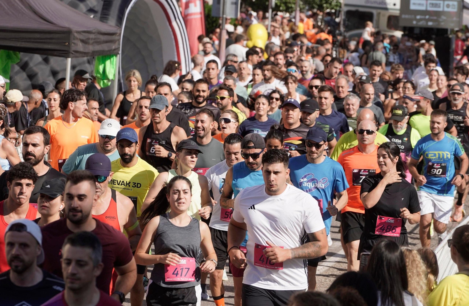 Galería | O Porriño une deporte y trabajo en una carrera multitudinaria