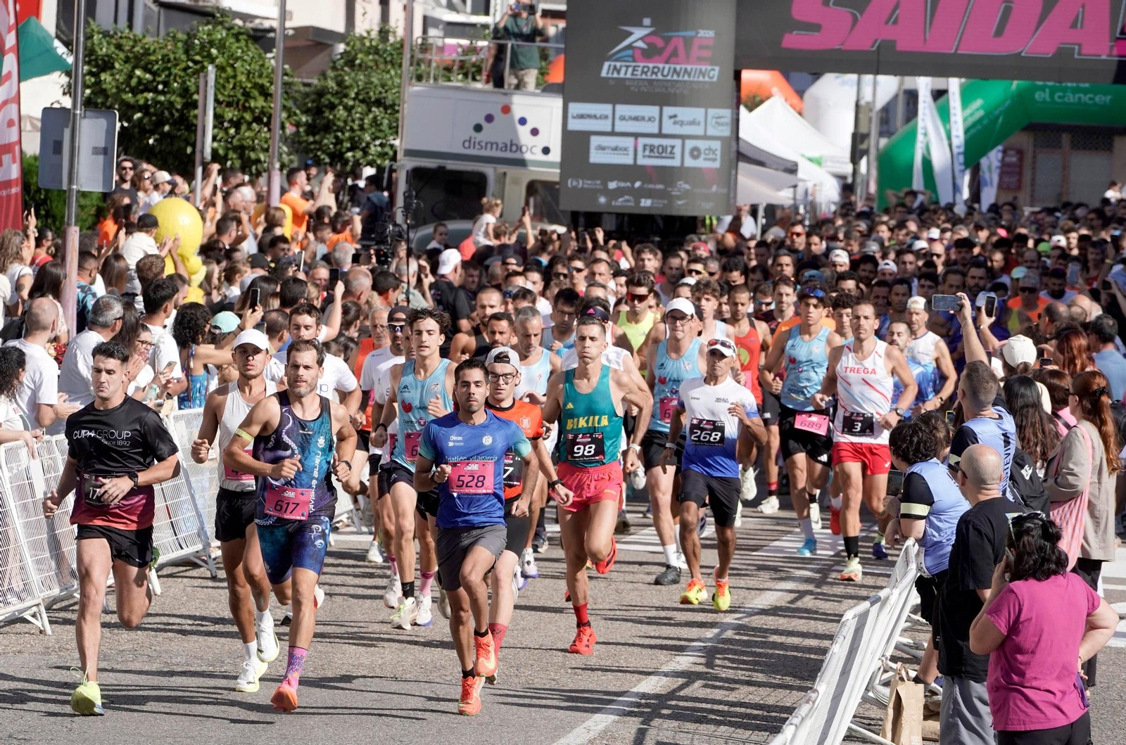 Galería | O Porriño une deporte y trabajo en una carrera multitudinaria