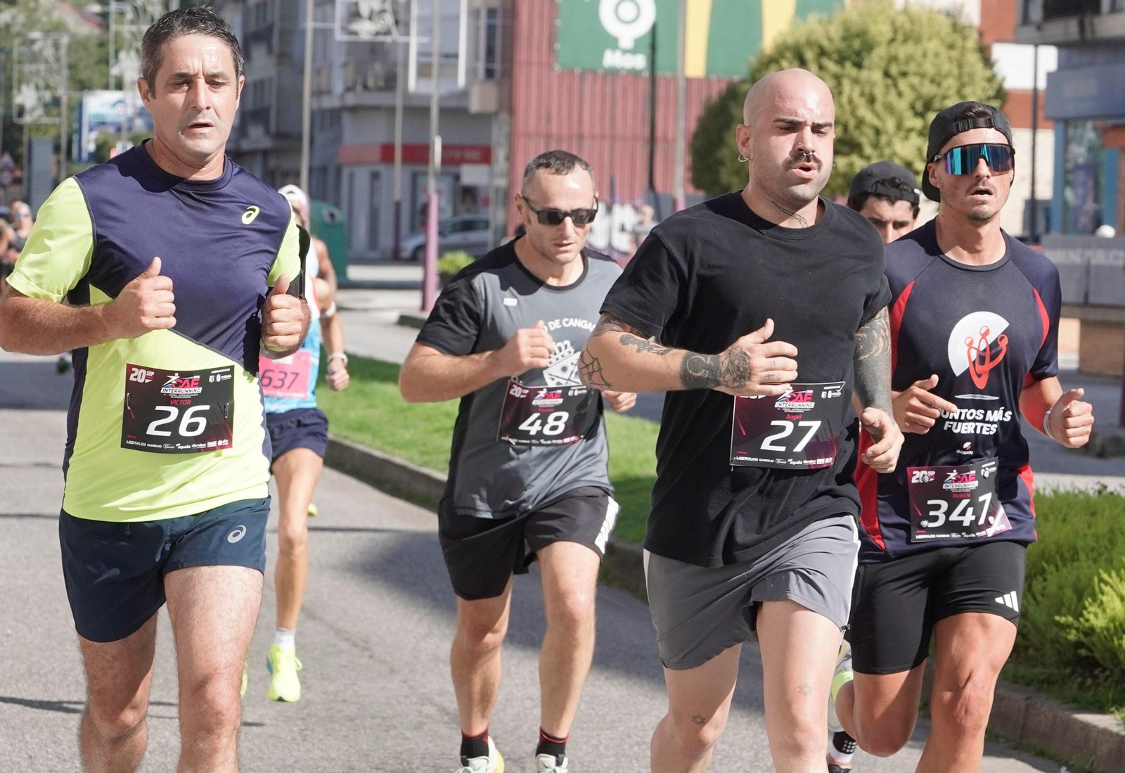 Galería | O Porriño une deporte y trabajo en una carrera multitudinaria