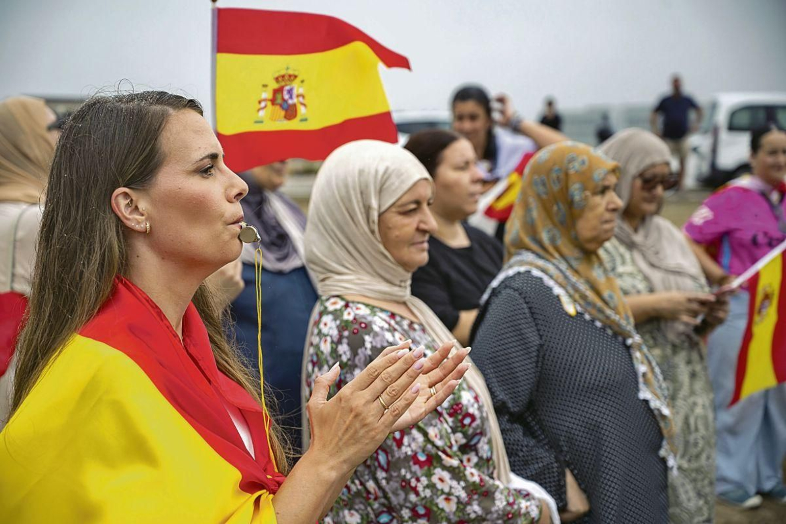 Varias personas se manifiestan ayer en Ceuta.