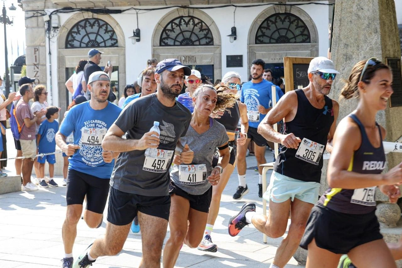Galería | Más de 1.300 personas corren y caminan por Baiona