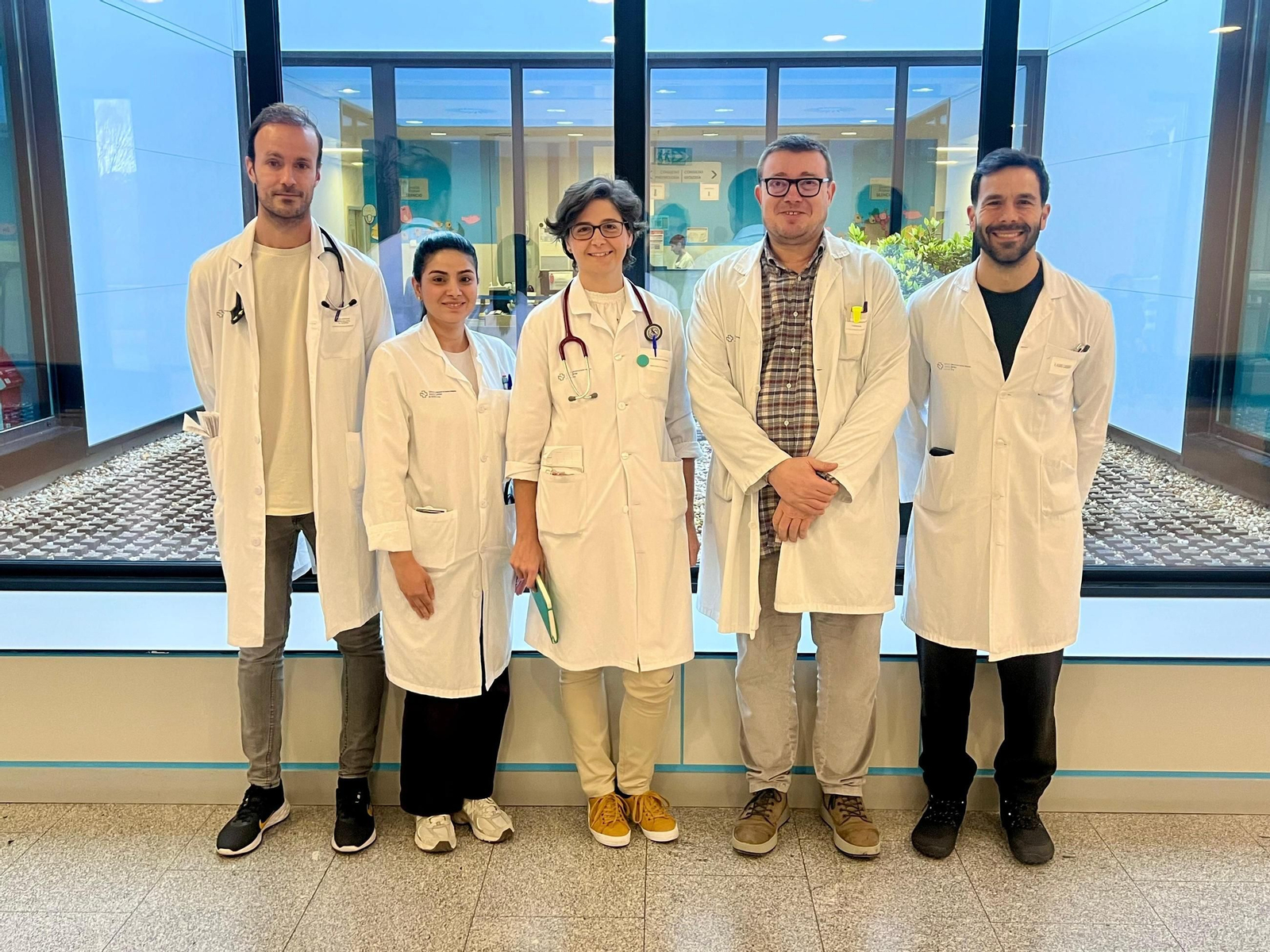 María Teresa Pérez, en el centro, con el equipo PROA.