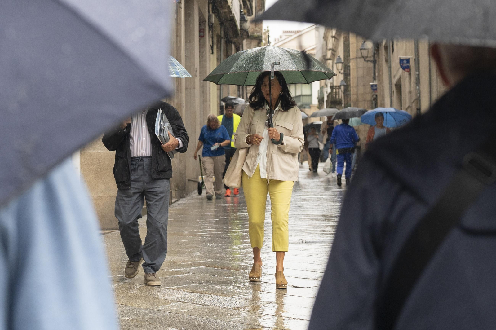 Galería | Otra tarde de agosto pasada por agua en Ourense